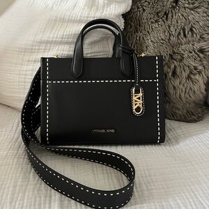 Brand new Michael Kors Gigi Messenger Bag with stitching detail